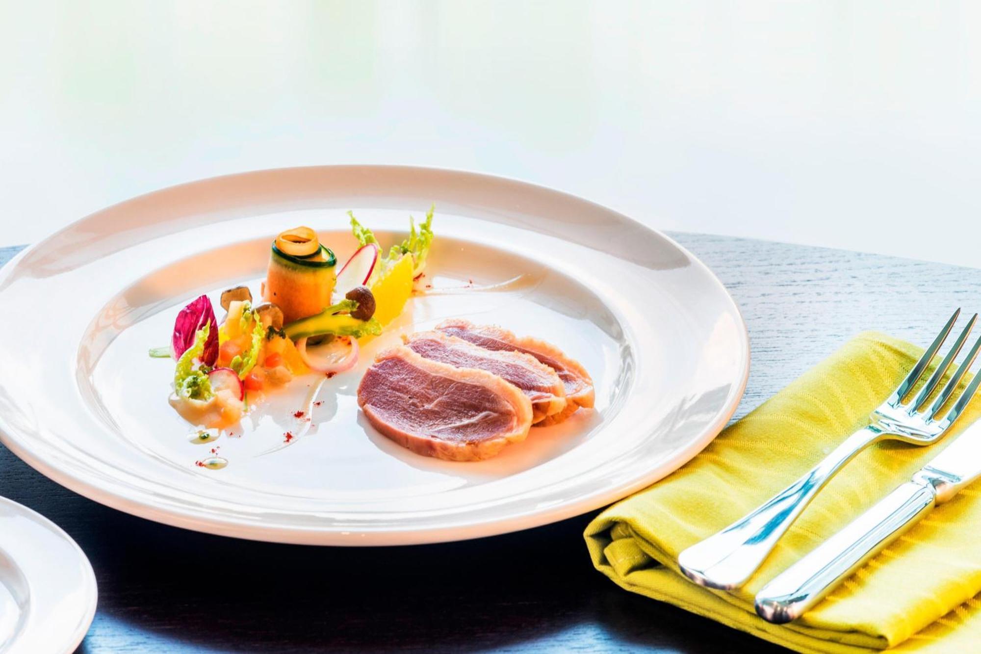 Le Meridien Putrajaya Luaran gambar A plate of duck confit
